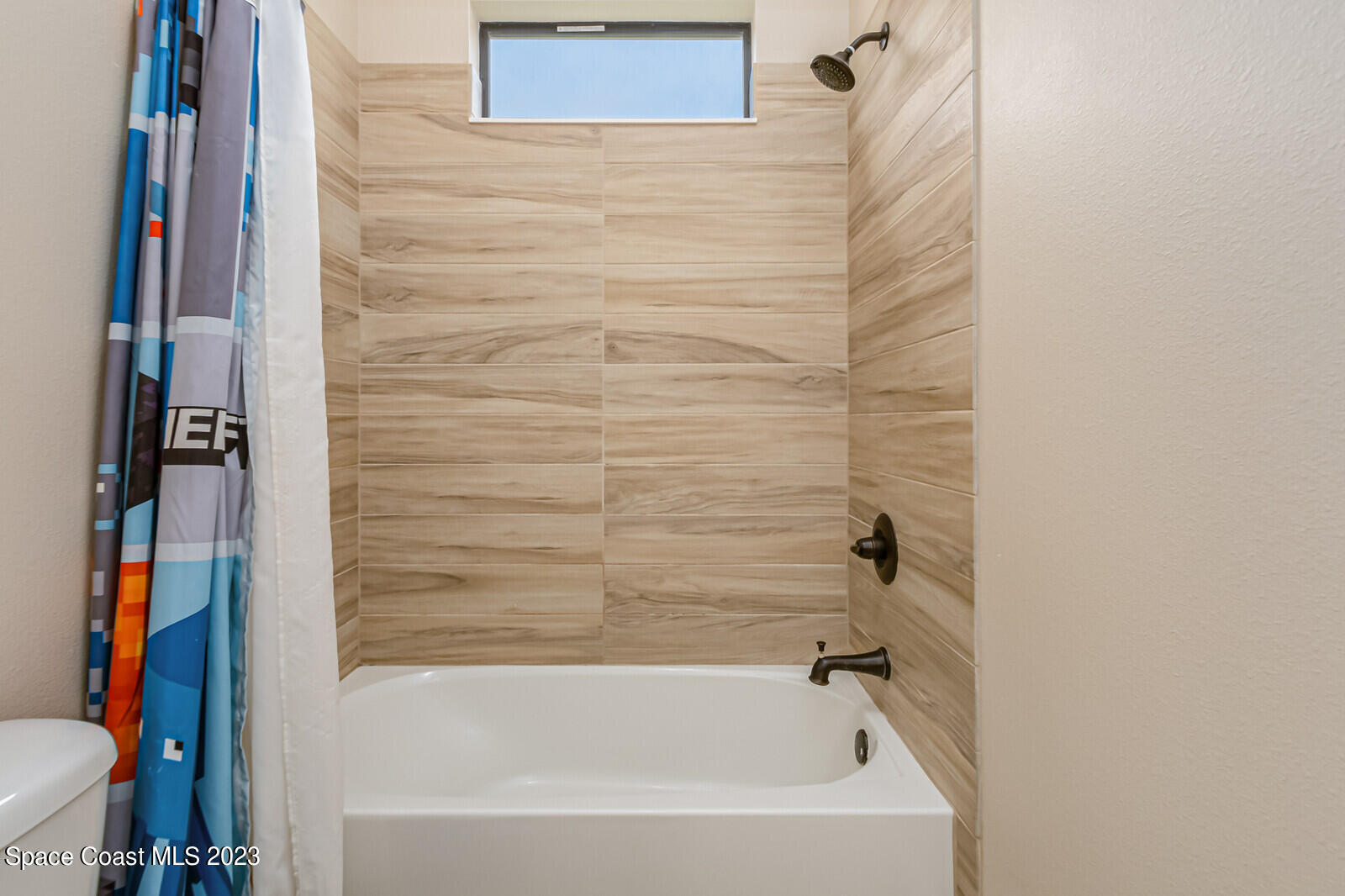 2928 Addison Drive Melbourne, FL 32940 - Photo 32 of 69 a bathroom with a bathtub
