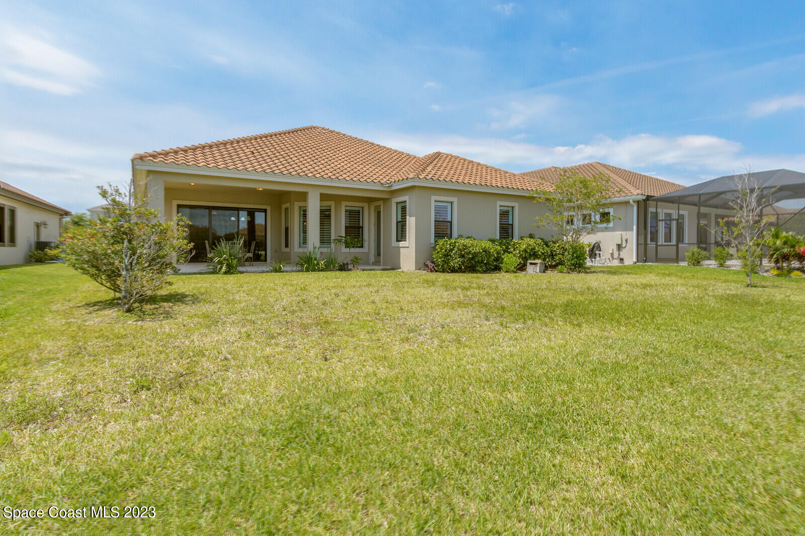 2928 Addison Drive Melbourne, FL 32940 - Photo 42 of 69 a front view of a house with a yard
