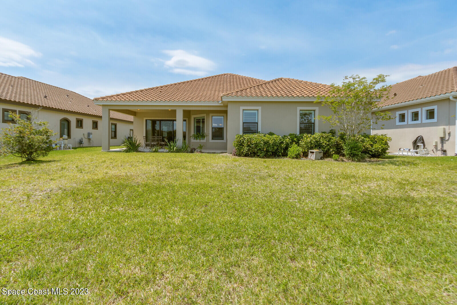 2928 Addison Drive Melbourne, FL 32940 - Photo 43 of 69 a front view of a house with a yard