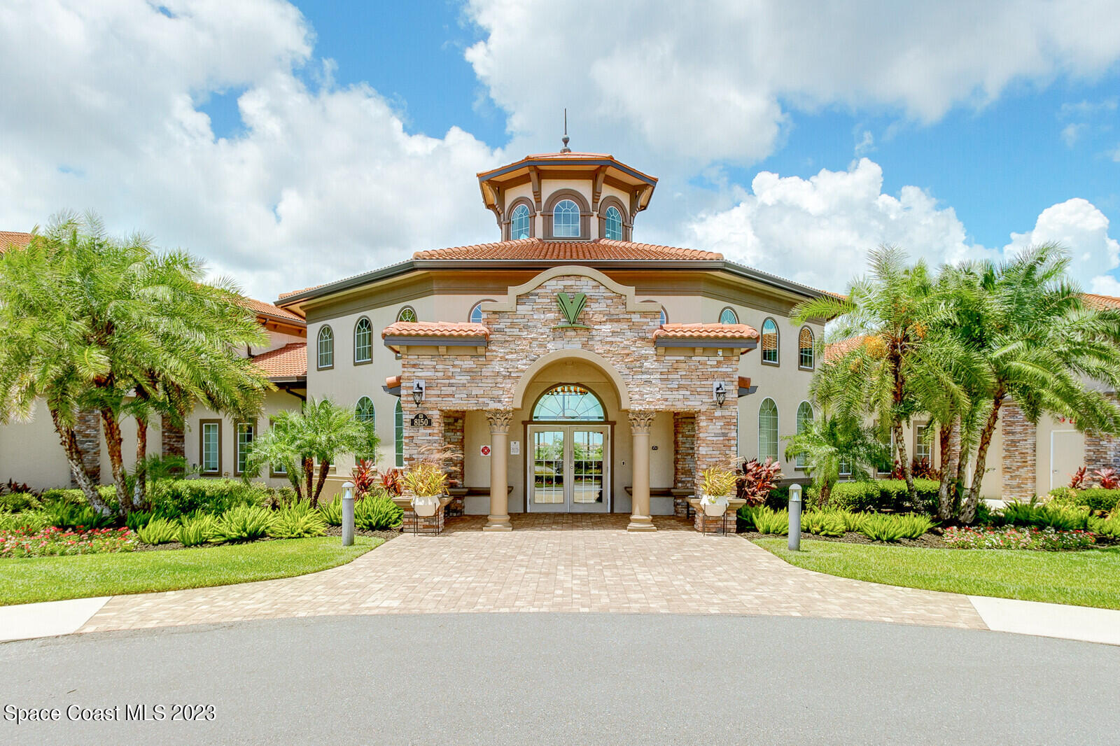 2928 Addison Drive Melbourne, FL 32940 - Photo 53 of 69 a front view of a house with a garden