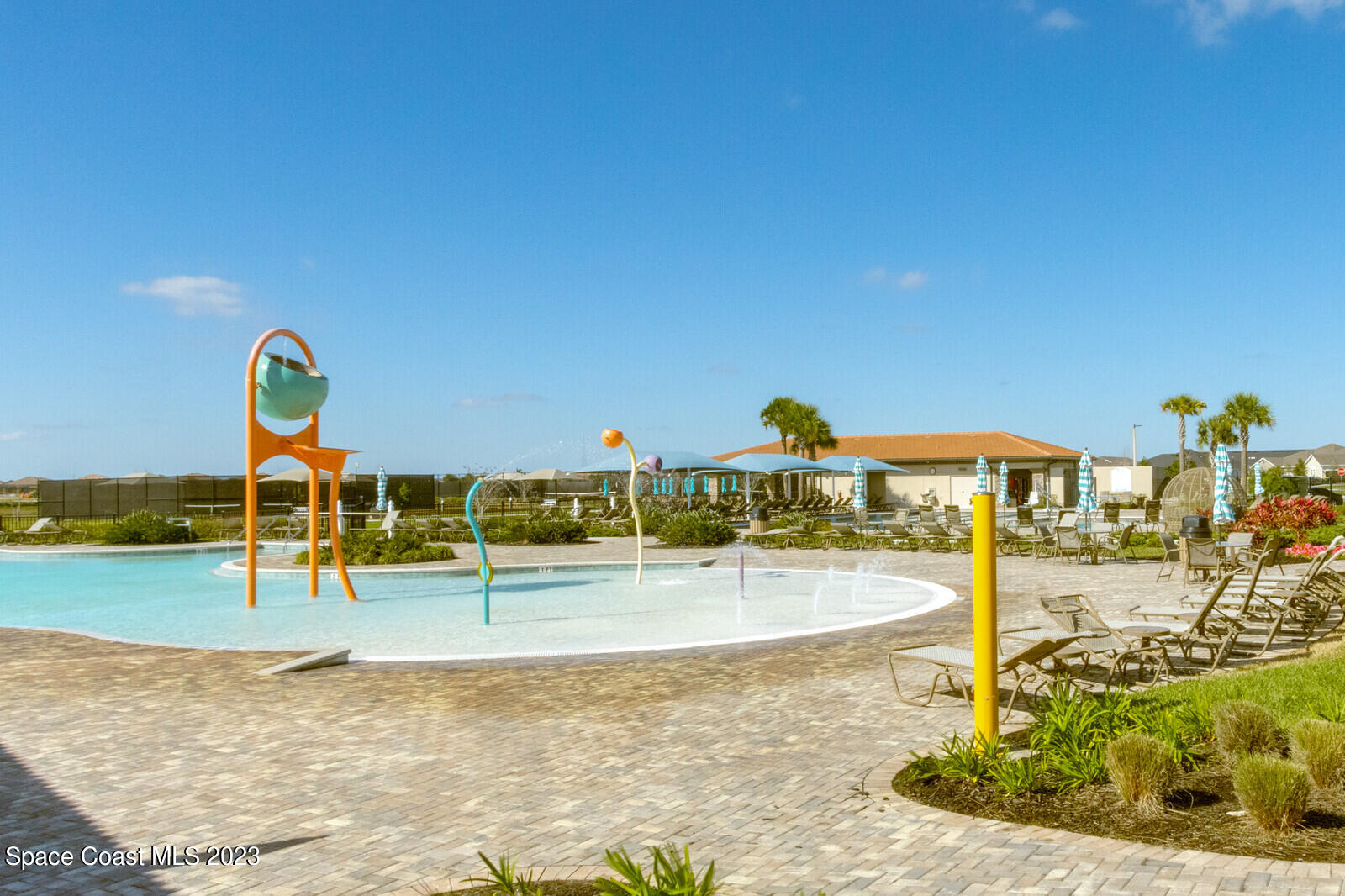 2928 Addison Drive Melbourne, FL 32940 - Photo 60 of 69 a view of a swimming pool with an outdoor seating