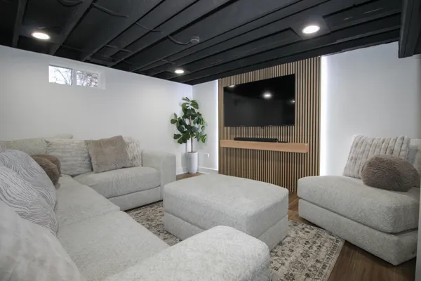 a room that has a table and chairs in it