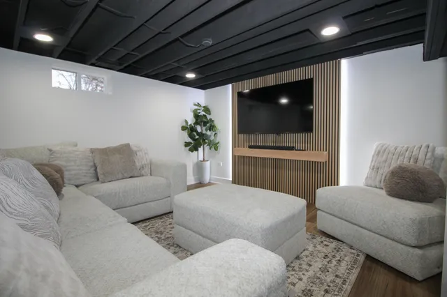 a room that has a table and chairs in it