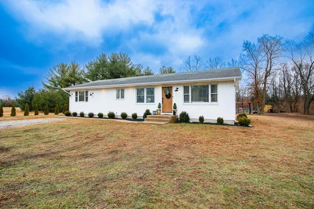 a view of a patio with swimming pool