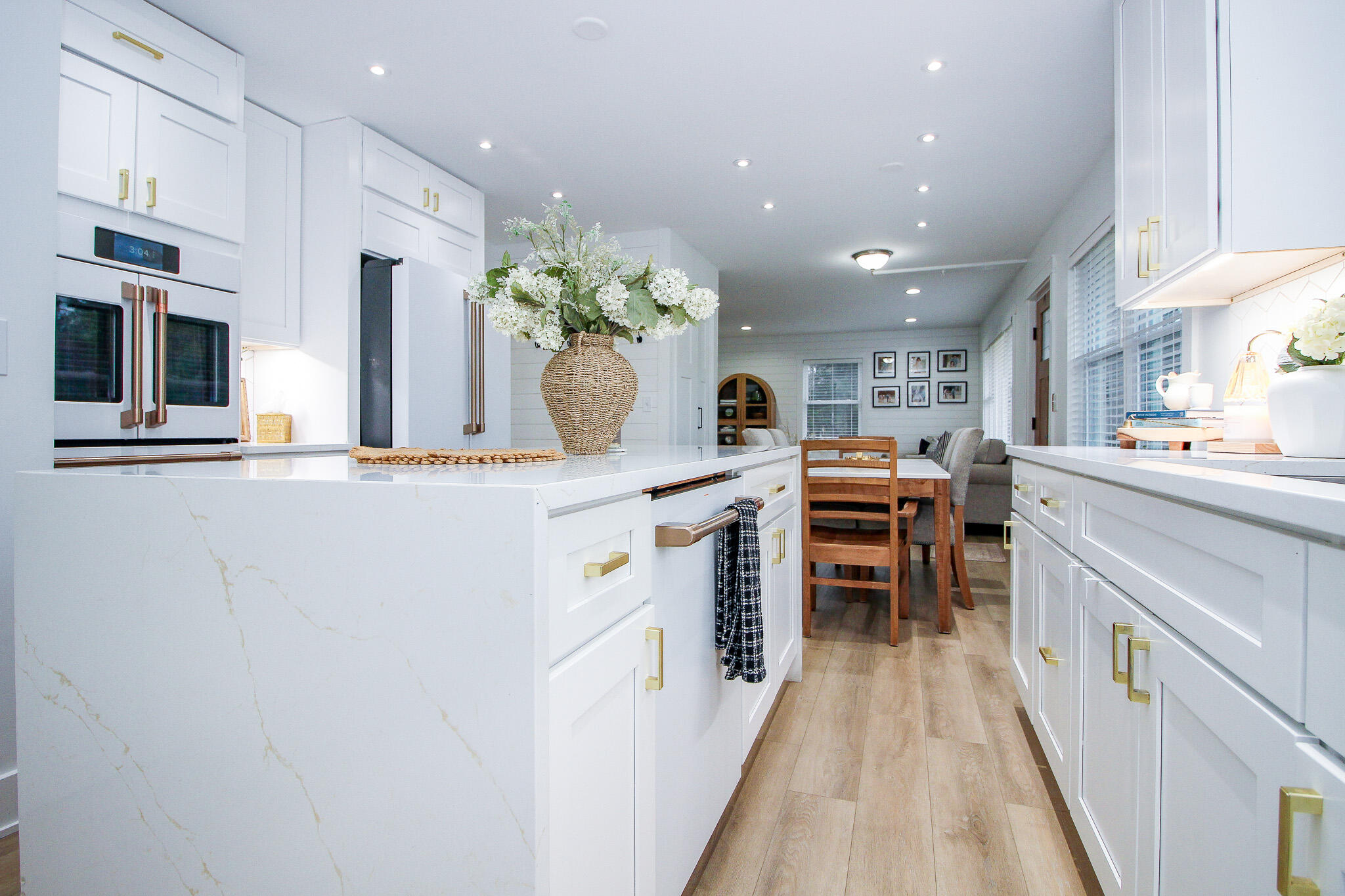 10791 North 1000 West Demotte, IN 46310 - Photo 5 of 55 a kitchen with kitchen island granite countertop lots of counter top space and stainless steel appliances