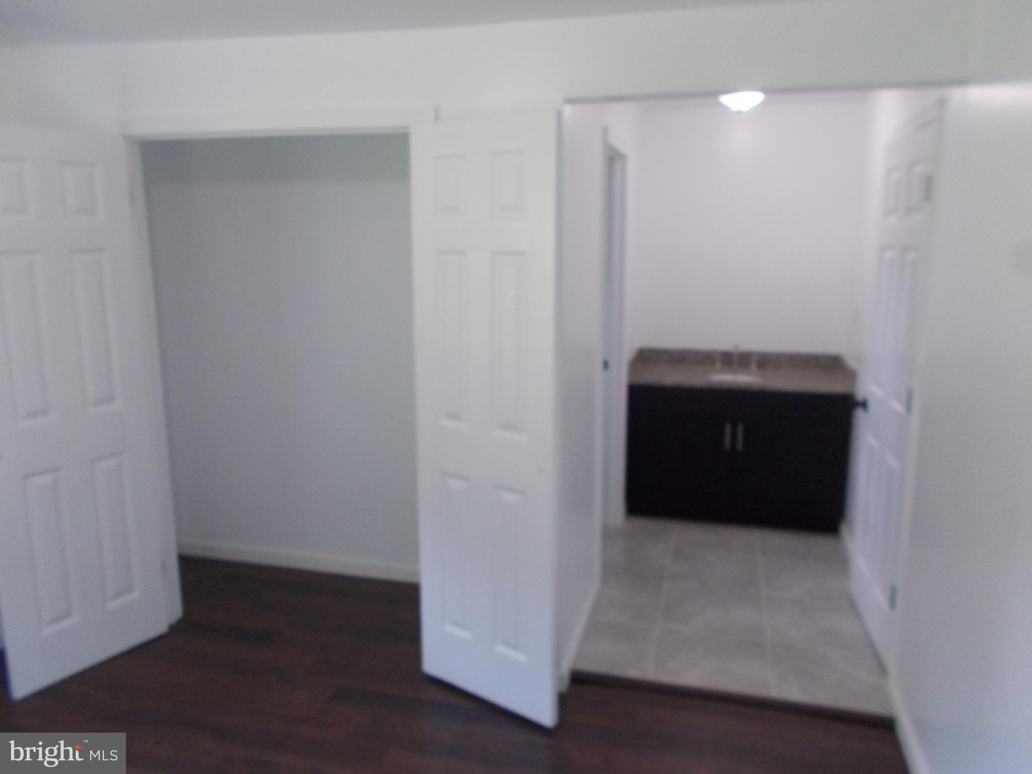 400 Mill Swamp Road Edgewater, MD 21037 - Photo 17 of 32 Master bedroom and entrance into master bathroom