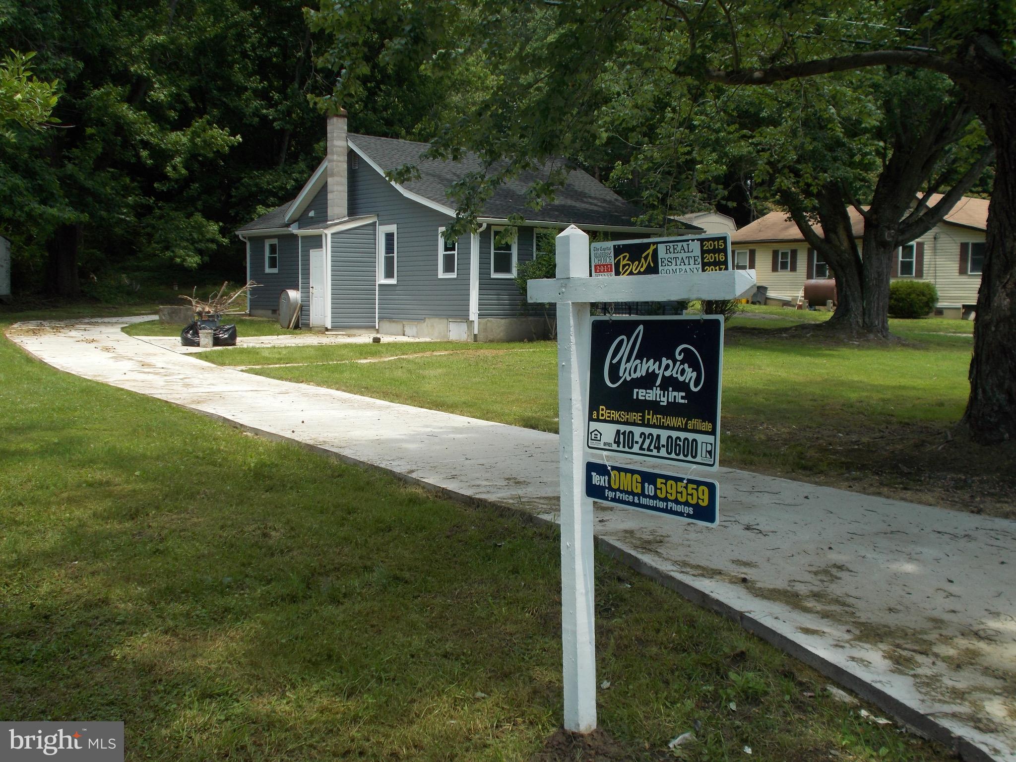 400 Mill Swamp Road Edgewater, MD 21037 - Photo 31 of 32 Champion Sign Post - Front yard