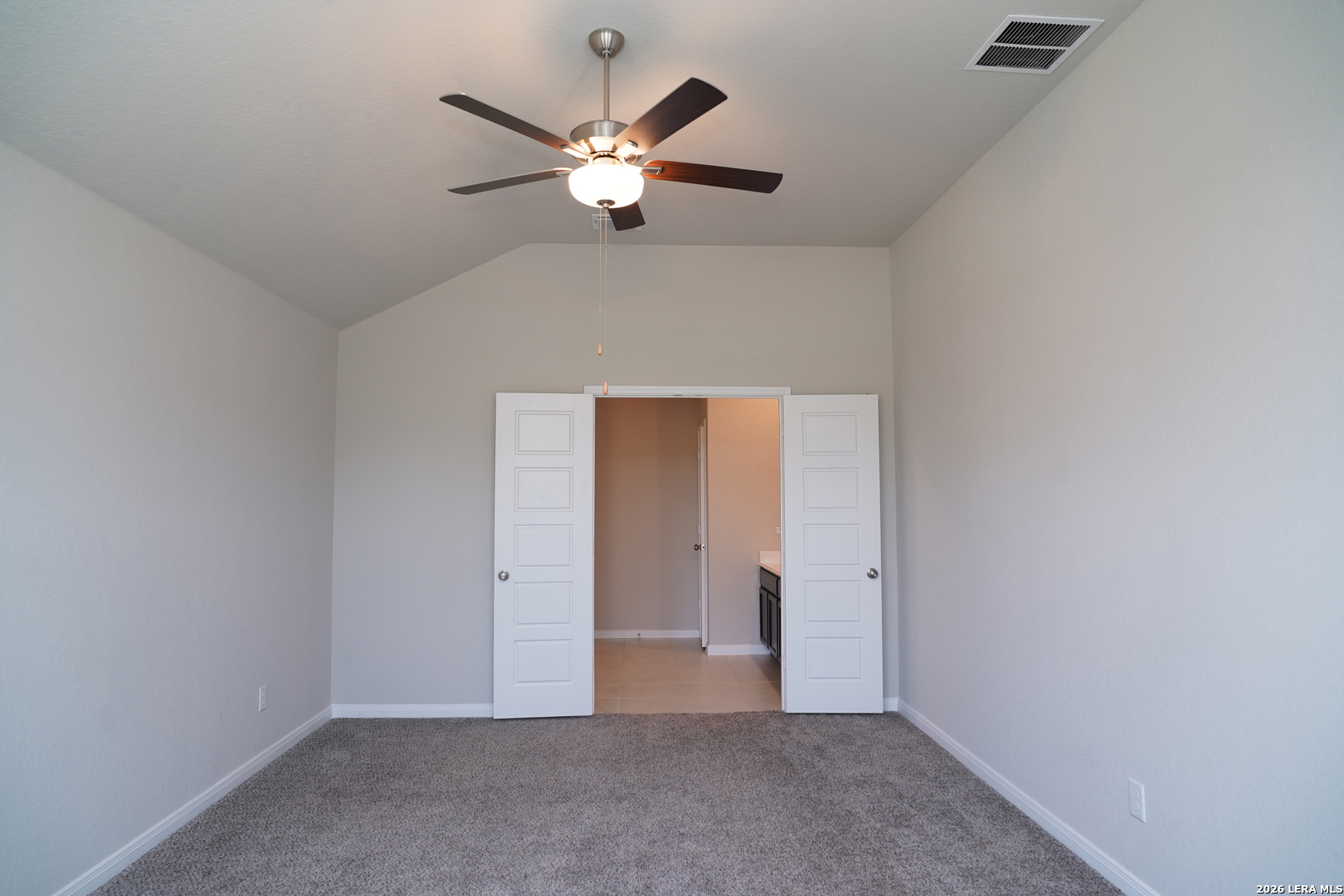 20929 Pleasanton Road San Antonio, TX 78264 - Photo 21 of 51 an empty room with closet and a chandelier fan