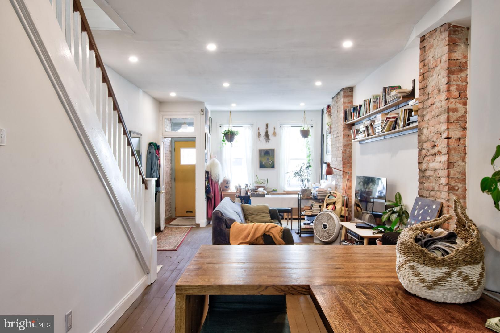 2044 Tasker Street Philadelphia, PA 19145 - Photo 3 of 15 a view of a living room and dining room