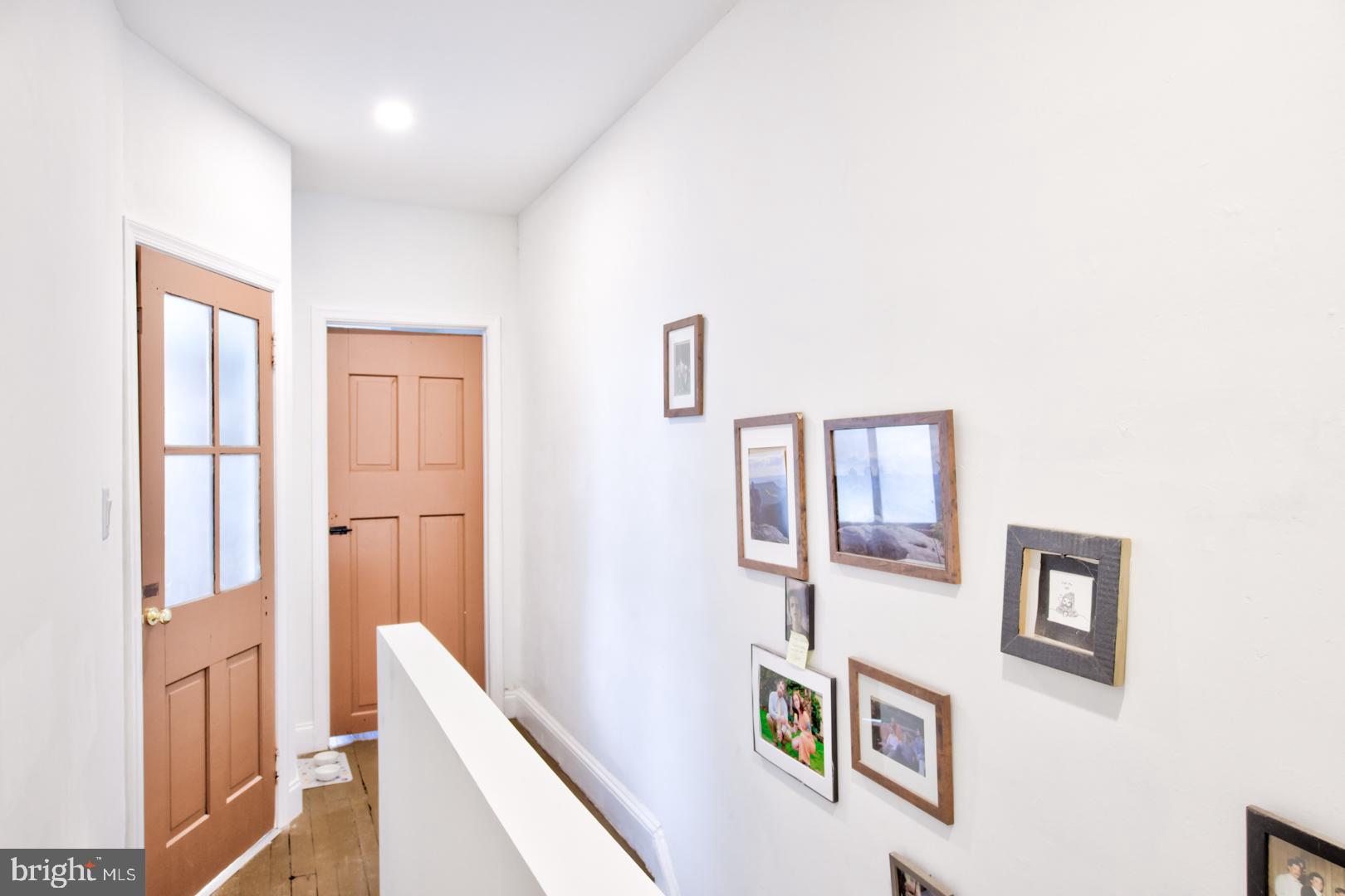 2044 Tasker Street Philadelphia, PA 19145 - Photo 7 of 15 a view of an entryway with wooden floor