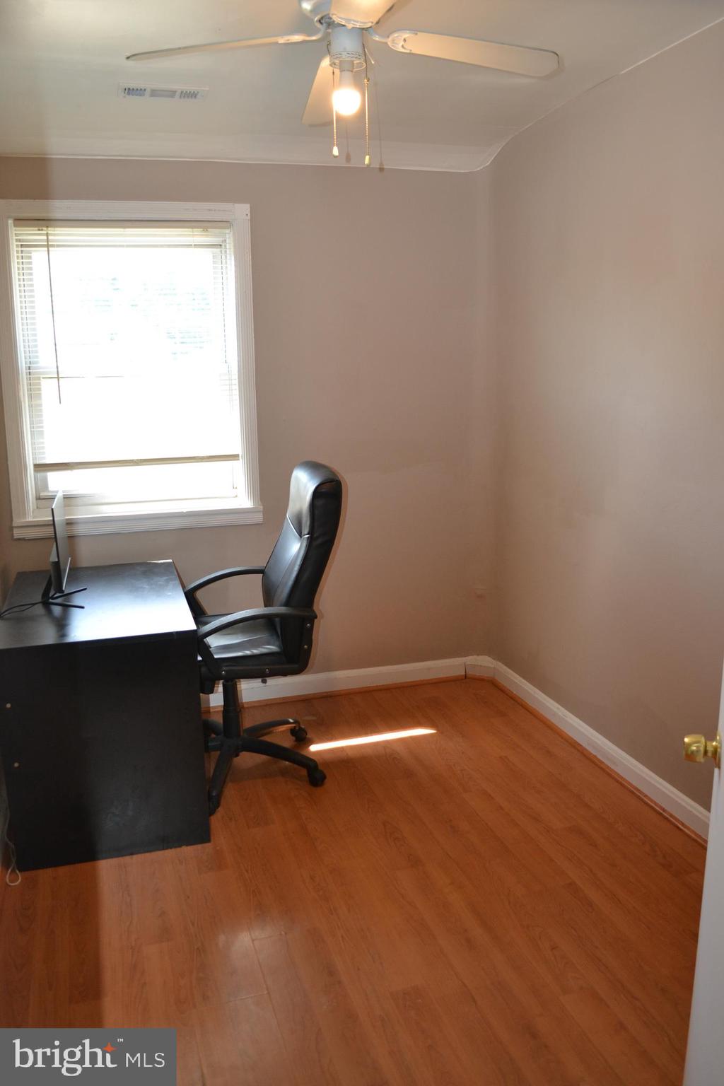 5153 Frederick Avenue Baltimore, MD 21229 - Photo 18 of 29 a room with a window