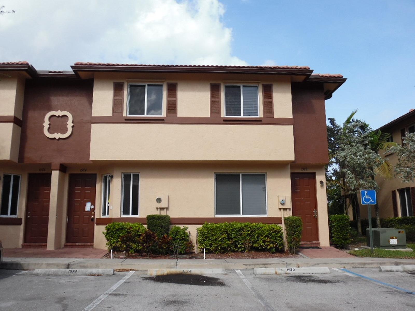 1974 Alamanda Way Riviera Beach, FL 33404 - Photo 1 of 20 Front