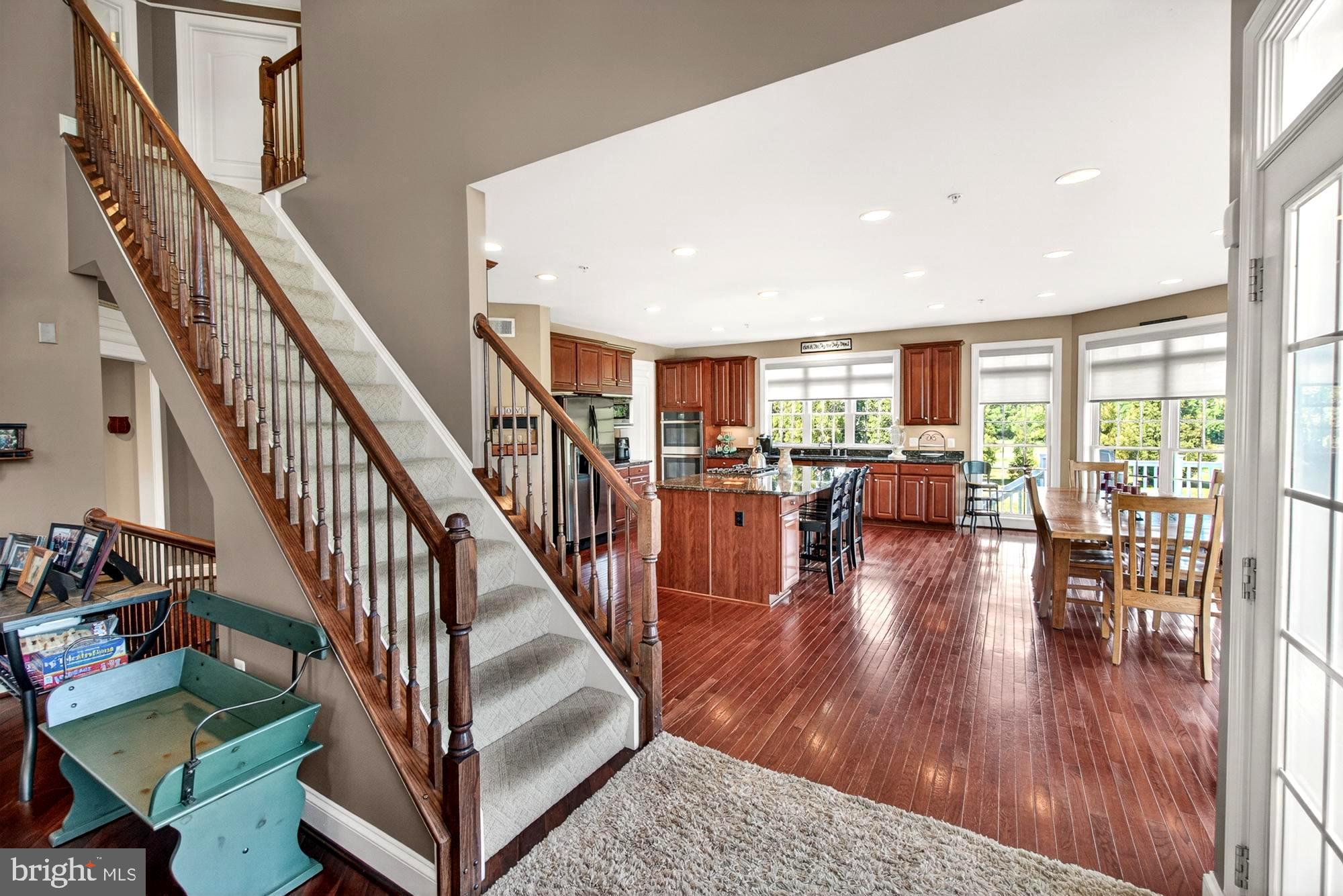 15512 Mount Nebo Road Poolesville, MD 20837 - Photo 43 of 125 Back staircase goes straight to the kitchen!