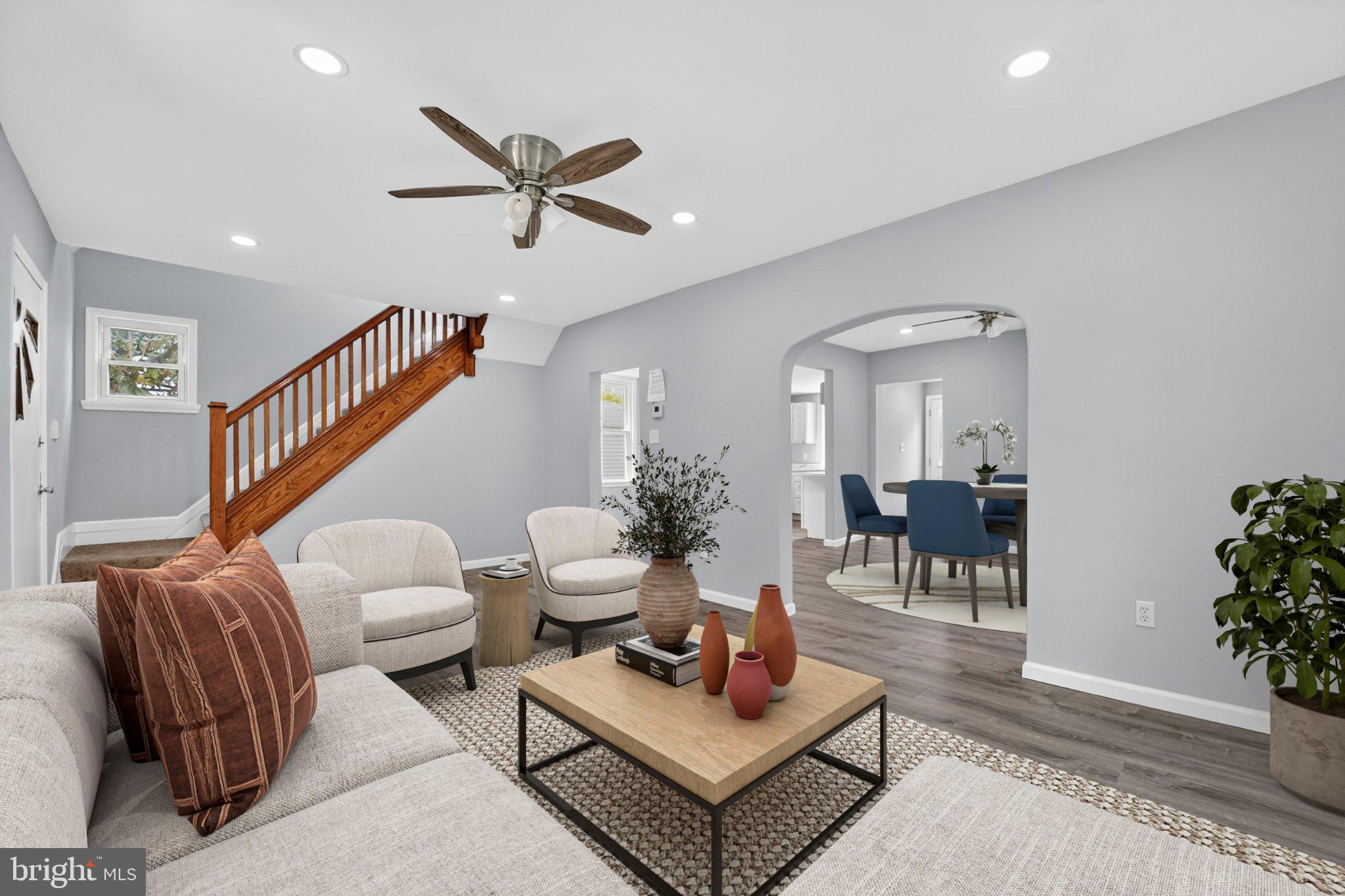 5312 Catalpha Road Baltimore, MD 21214 - Photo 11 of 59 a living room with furniture and wooden floor