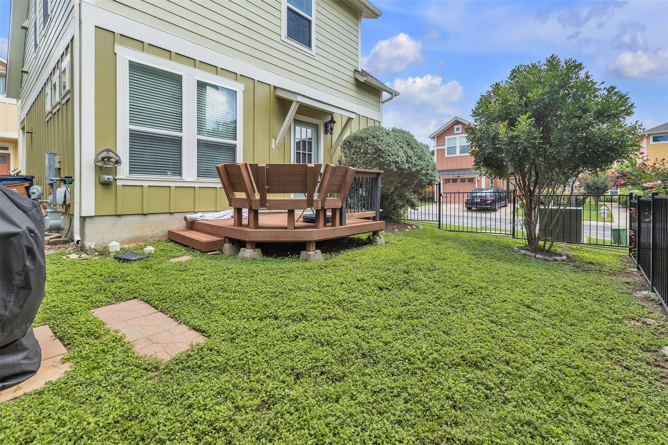 12212 Tawny Farms Road, Unit 142 Austin, TX 78748 - Photo 16 of 21 Green landscaping and a built-in deck offer a delightful outdoor space.