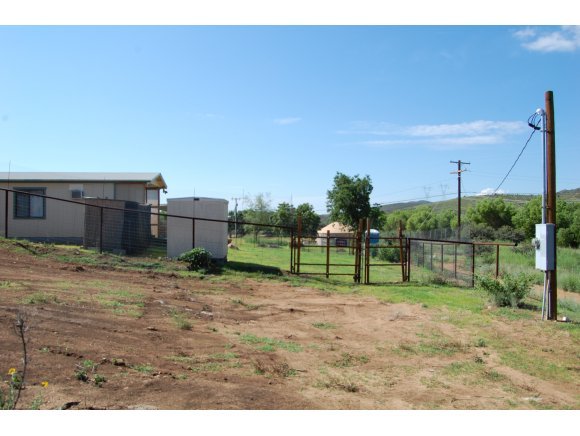 1340 Running Springs Road Dewey, AZ 86327 - Photo 14 of 20 a backyard of a house with lots of green space