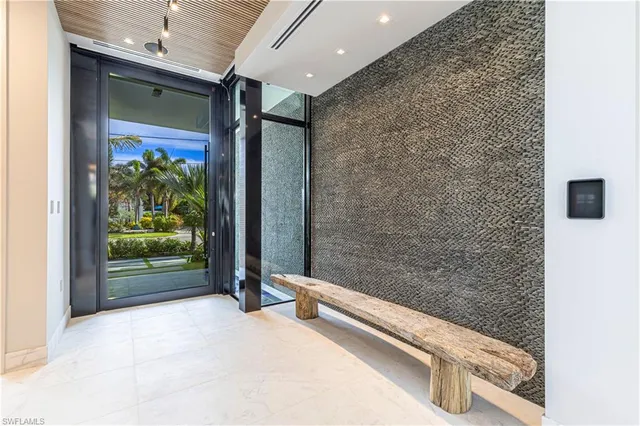 a view of lobby with mirror