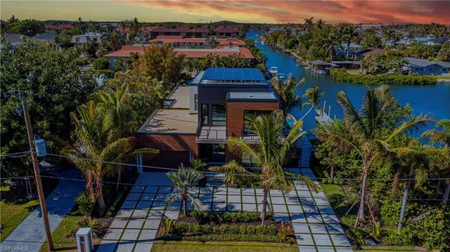 a view of a house with a garden
