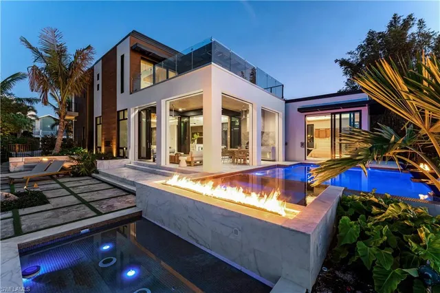 a view of a house with a swimming pool