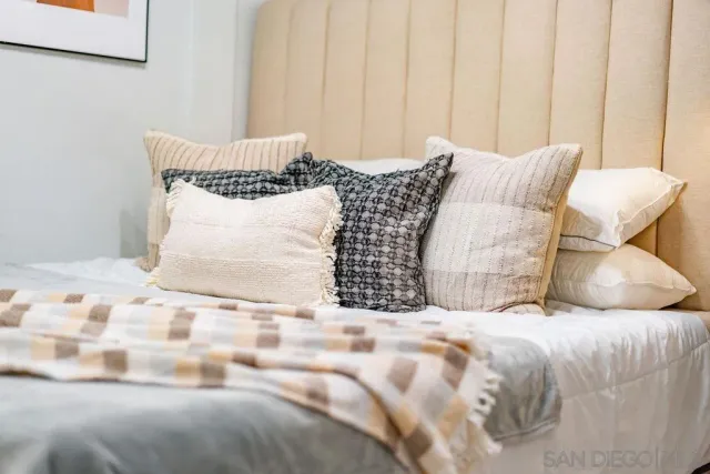 a view of a bedroom with a bed