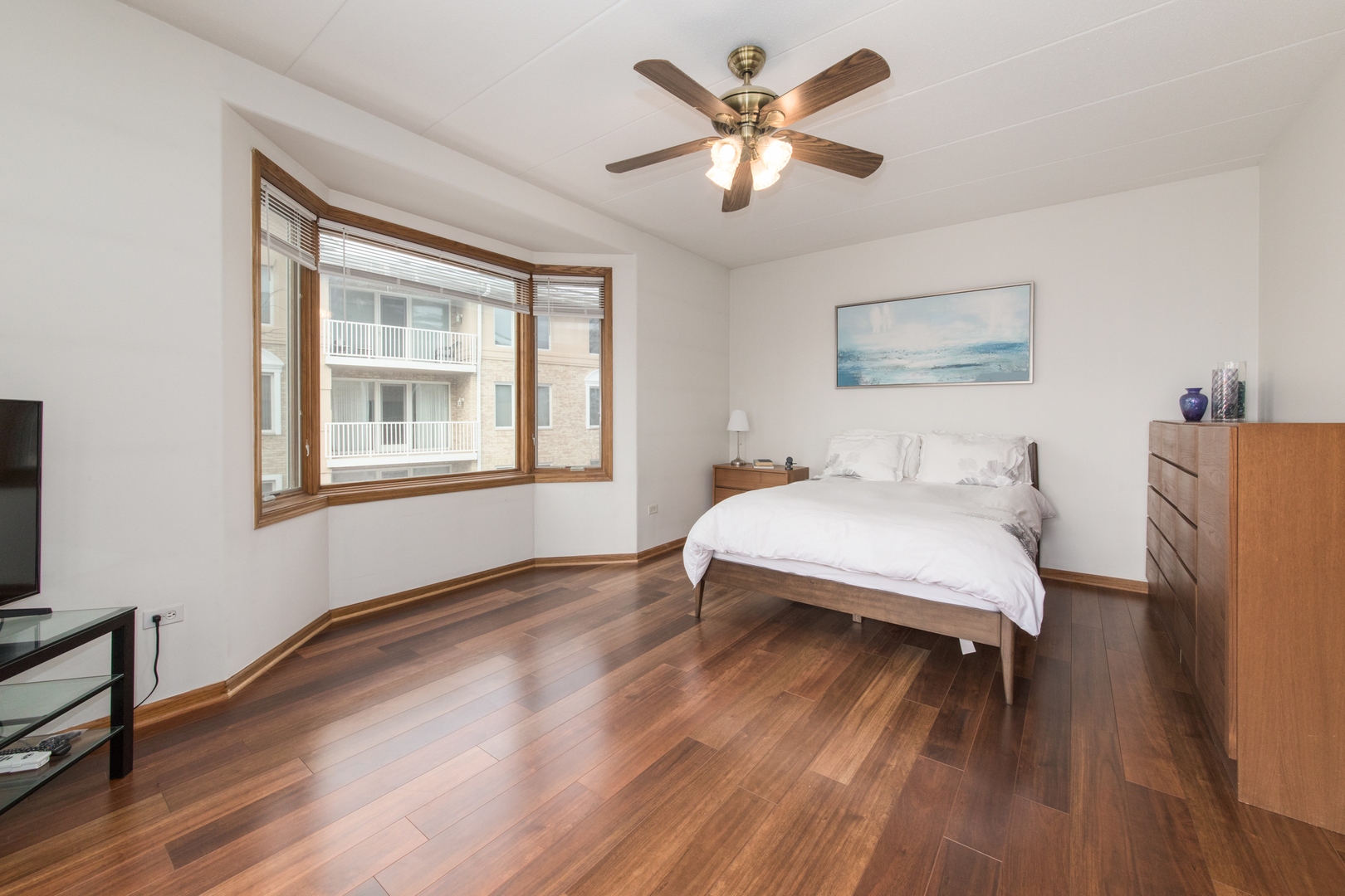 1705 Pavilion Way, Unit 401 Park Ridge, IL 60068 - Photo 15 of 25 a bedroom with a bed and a window