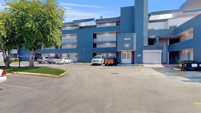 a car parked in front of a building
