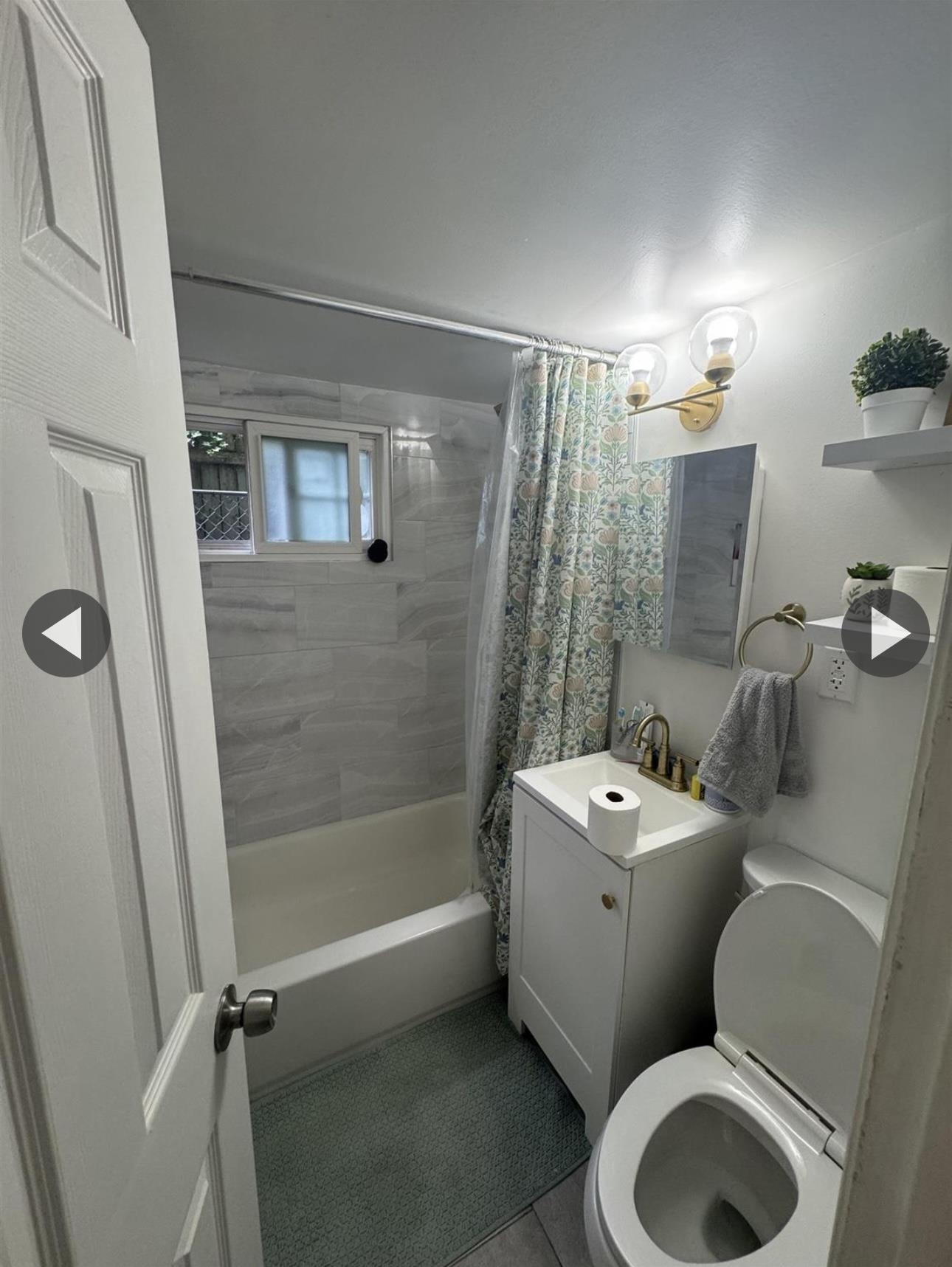 315 22nd Street Union City, NJ 07087 - Photo 11 of 11 a bathroom with a toilet sink and shower