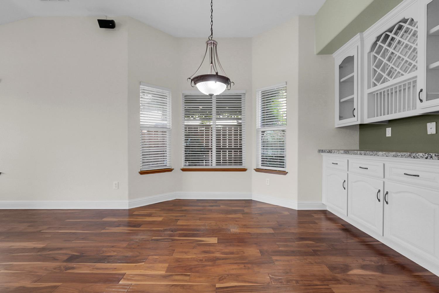 1163 Bailey Drive Ripon, CA 95366 - Photo 9 of 37 Dining nook beautifully adorned with a built in hutch and wine storage.