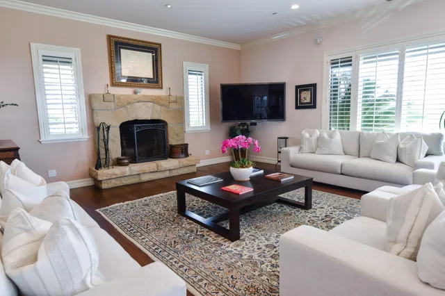 a spacious bathroom with a double vanity sink and a mirror