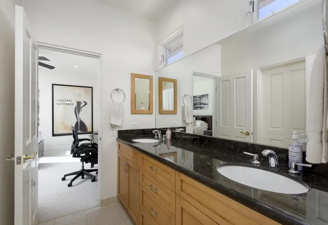 a view of a house with a street