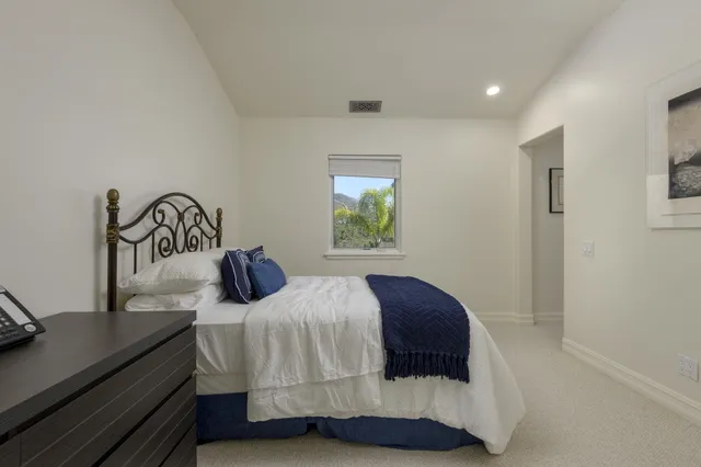 a view of balcony with furniture