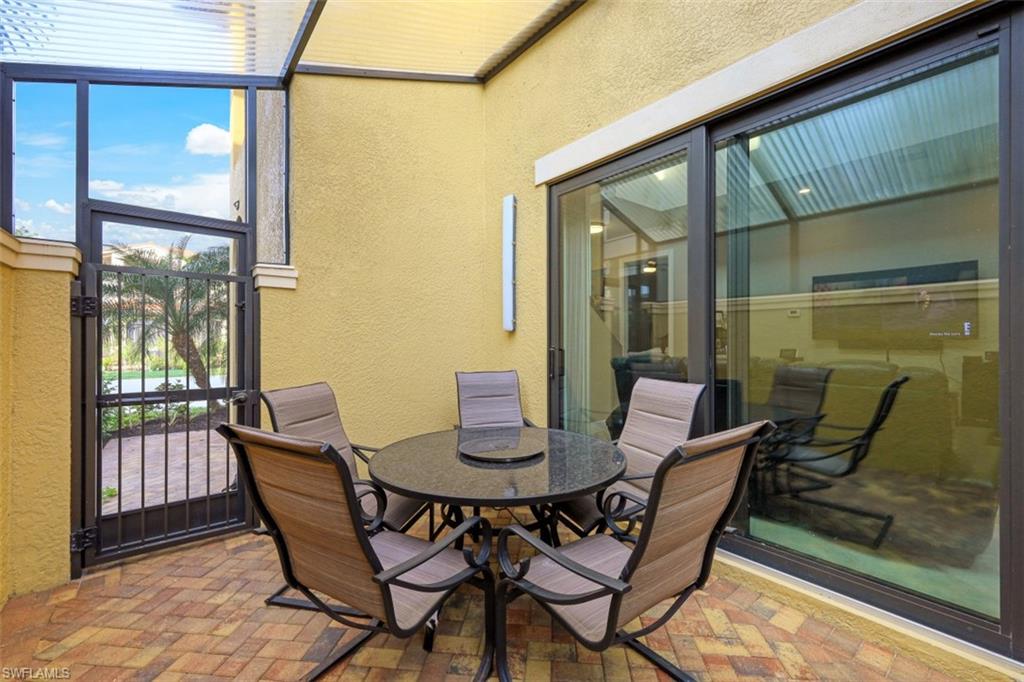 1316 Kendari Terrace Naples, FL 34113 - Photo 17 of 31 a view of a outdoor seating area