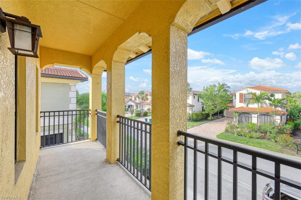 1316 Kendari Terrace Naples, FL 34113 - Photo 18 of 31 a view of a street from a balcony