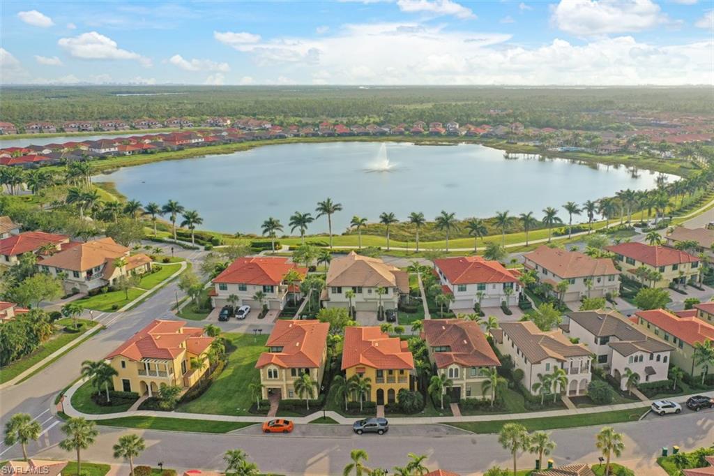 1316 Kendari Terrace Naples, FL 34113 - Photo 20 of 31 an aerial view of residential houses with outdoor space and river