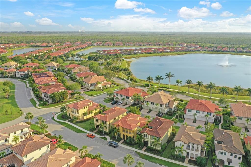 1316 Kendari Terrace Naples, FL 34113 - Photo 22 of 31 an aerial view of ocean and residential houses with outdoor space