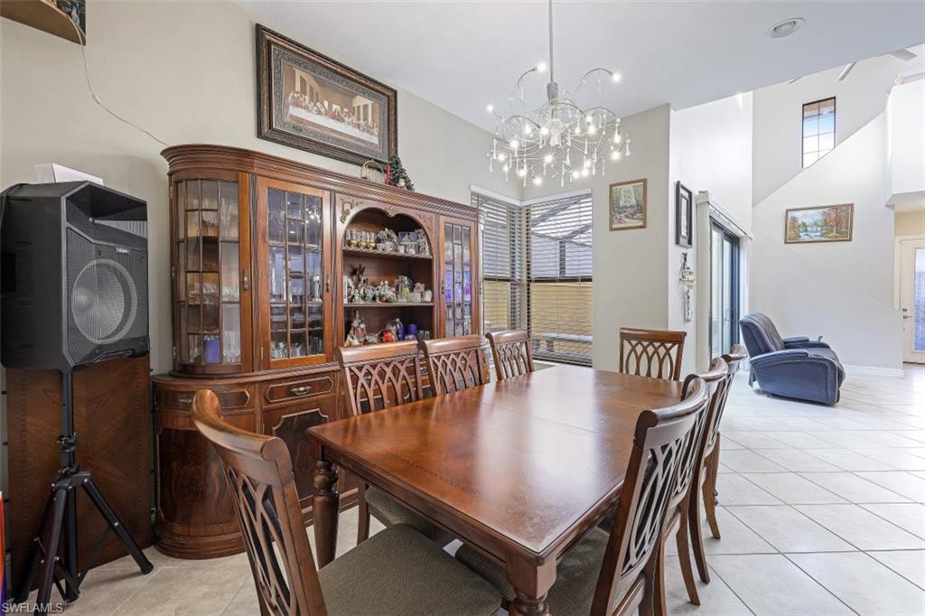 1316 Kendari Terrace Naples, FL 34113 - Photo 9 of 31 a view of a dining room with furniture