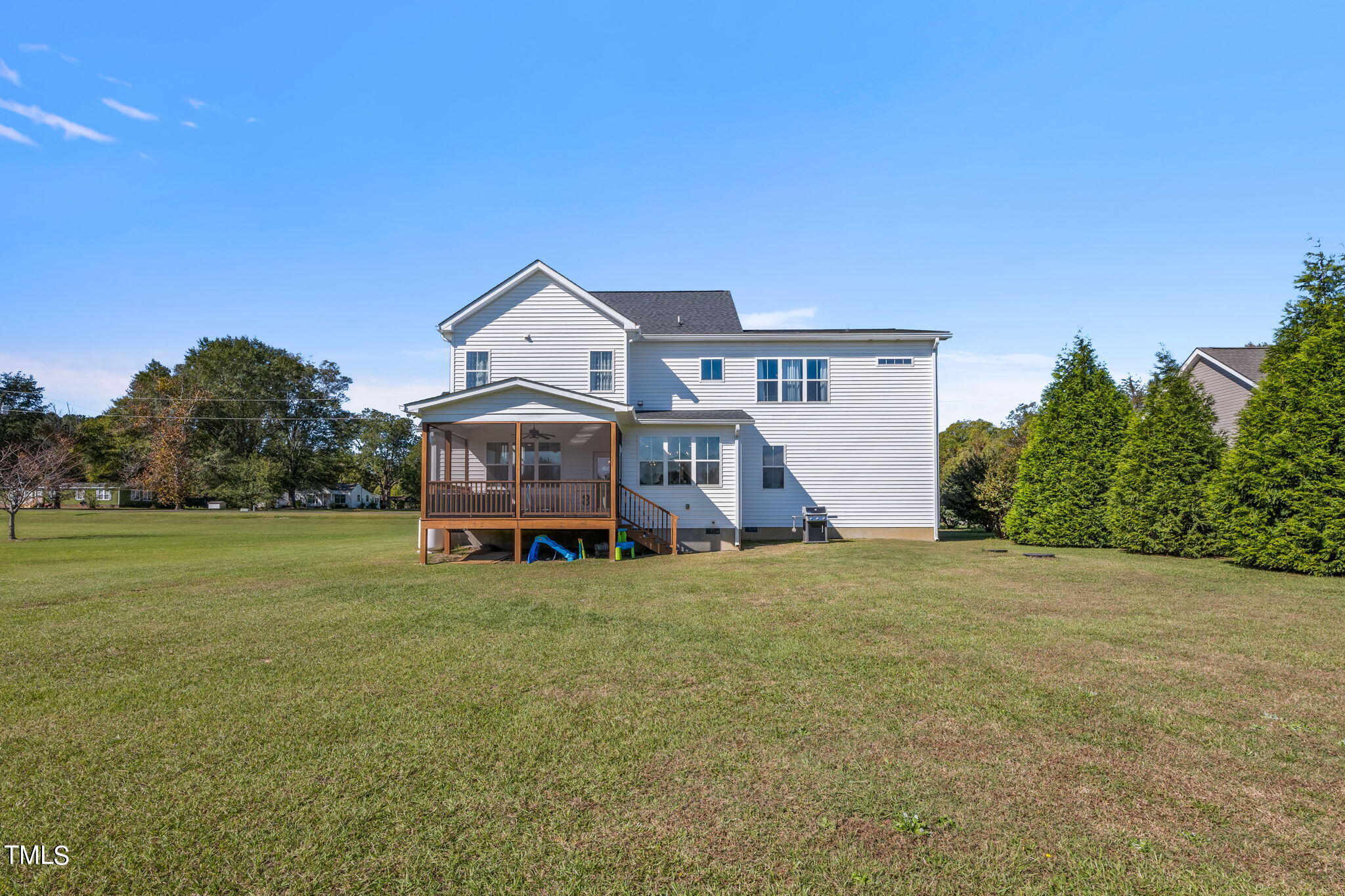 6217 Mal Weathers Road Raleigh, NC 27603 - Photo 11 of 59 a house with trees in the background