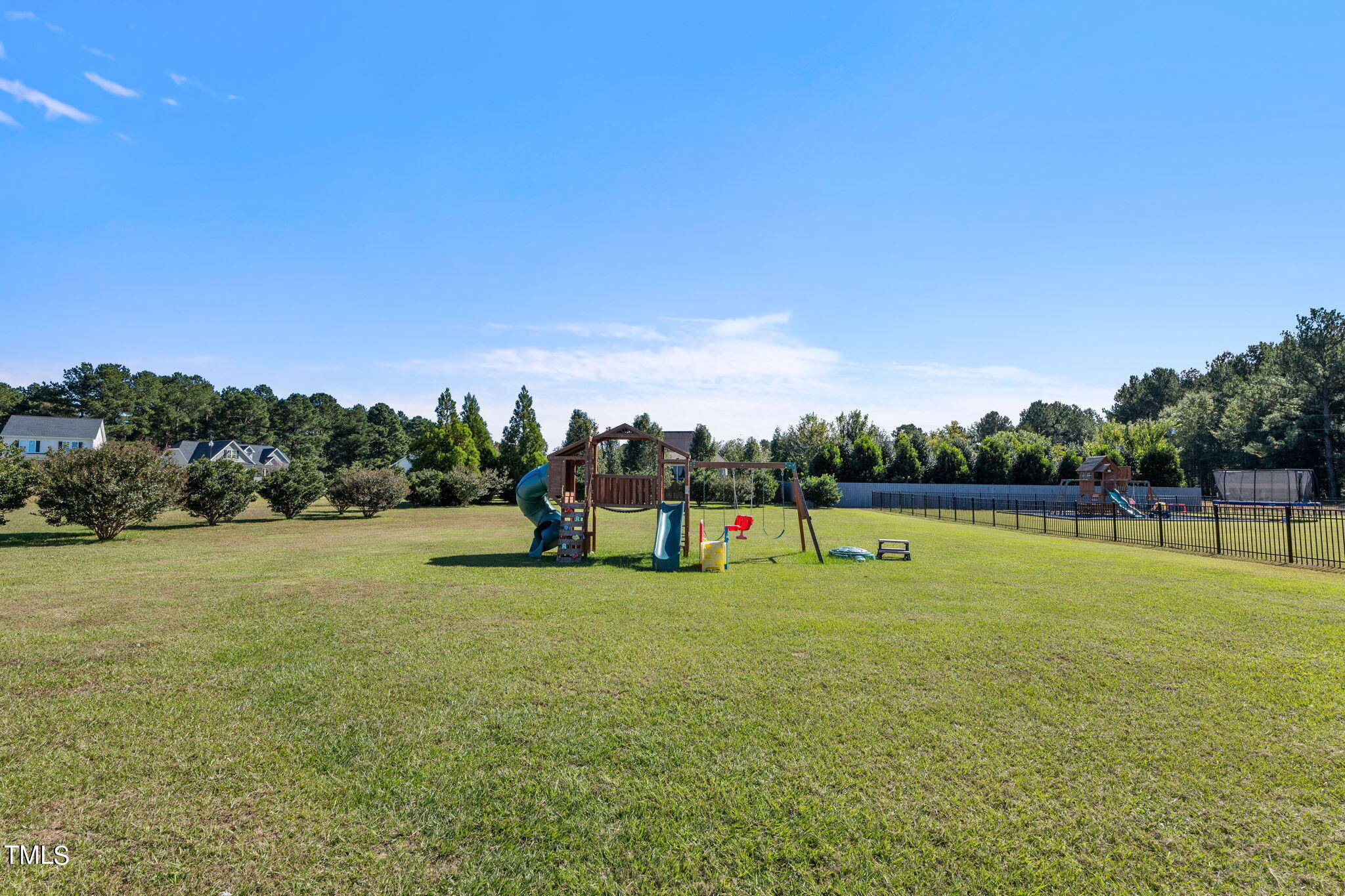 6217 Mal Weathers Road Raleigh, NC 27603 - Photo 12 of 59 a view of a lake with outdoor space