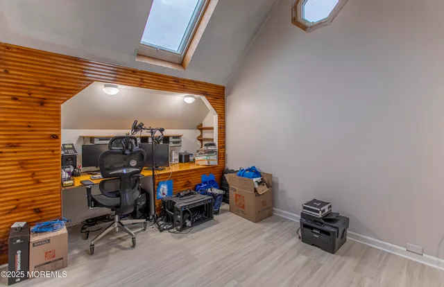 a bathroom with a tub sink and vanity