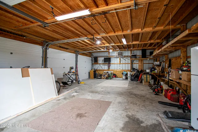 a view of a garage with storage