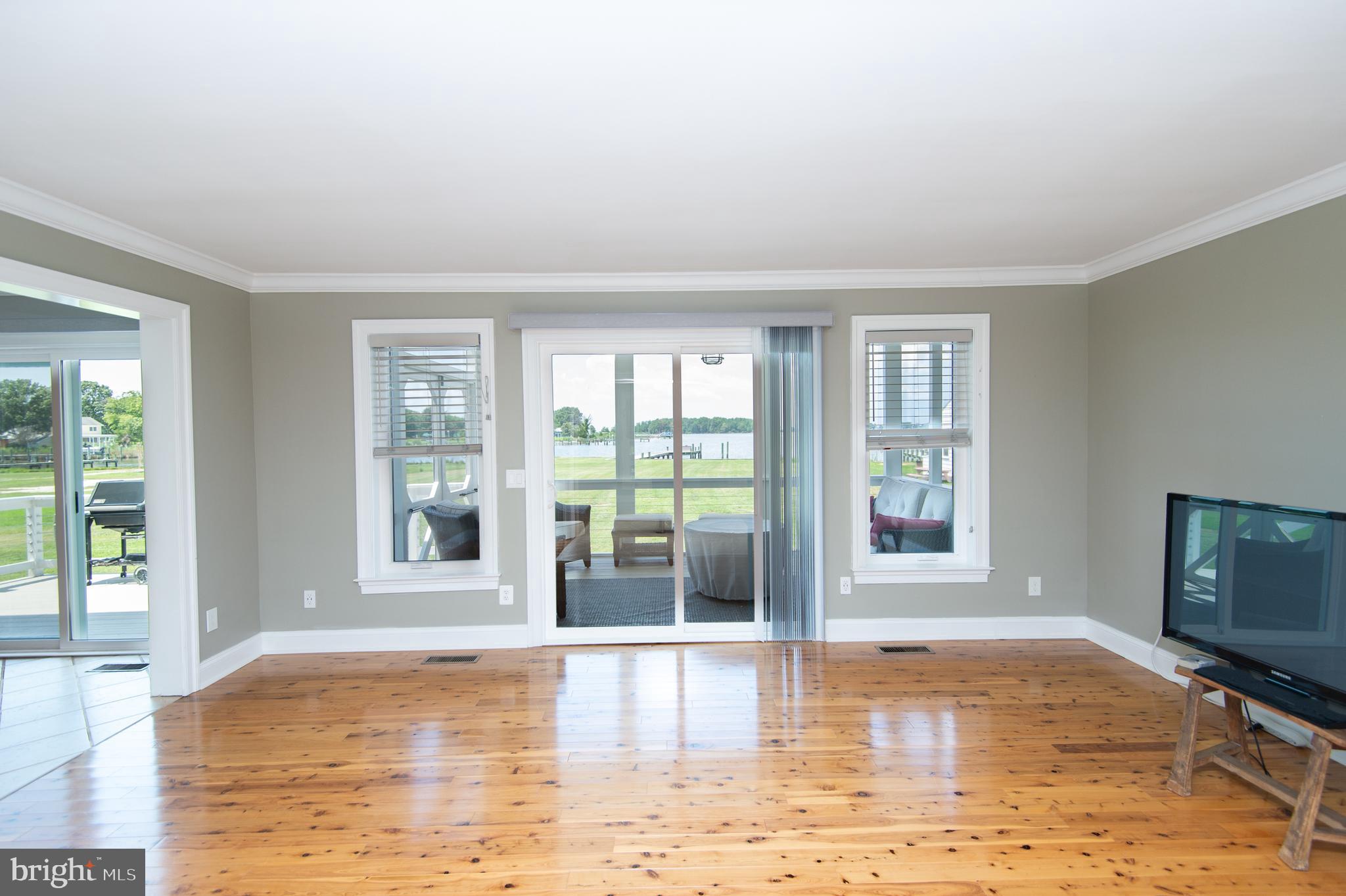 6106 Twin Point Cove Road Cambridge, MD 21613 - Photo 12 of 120 Family Room to Screened Porch