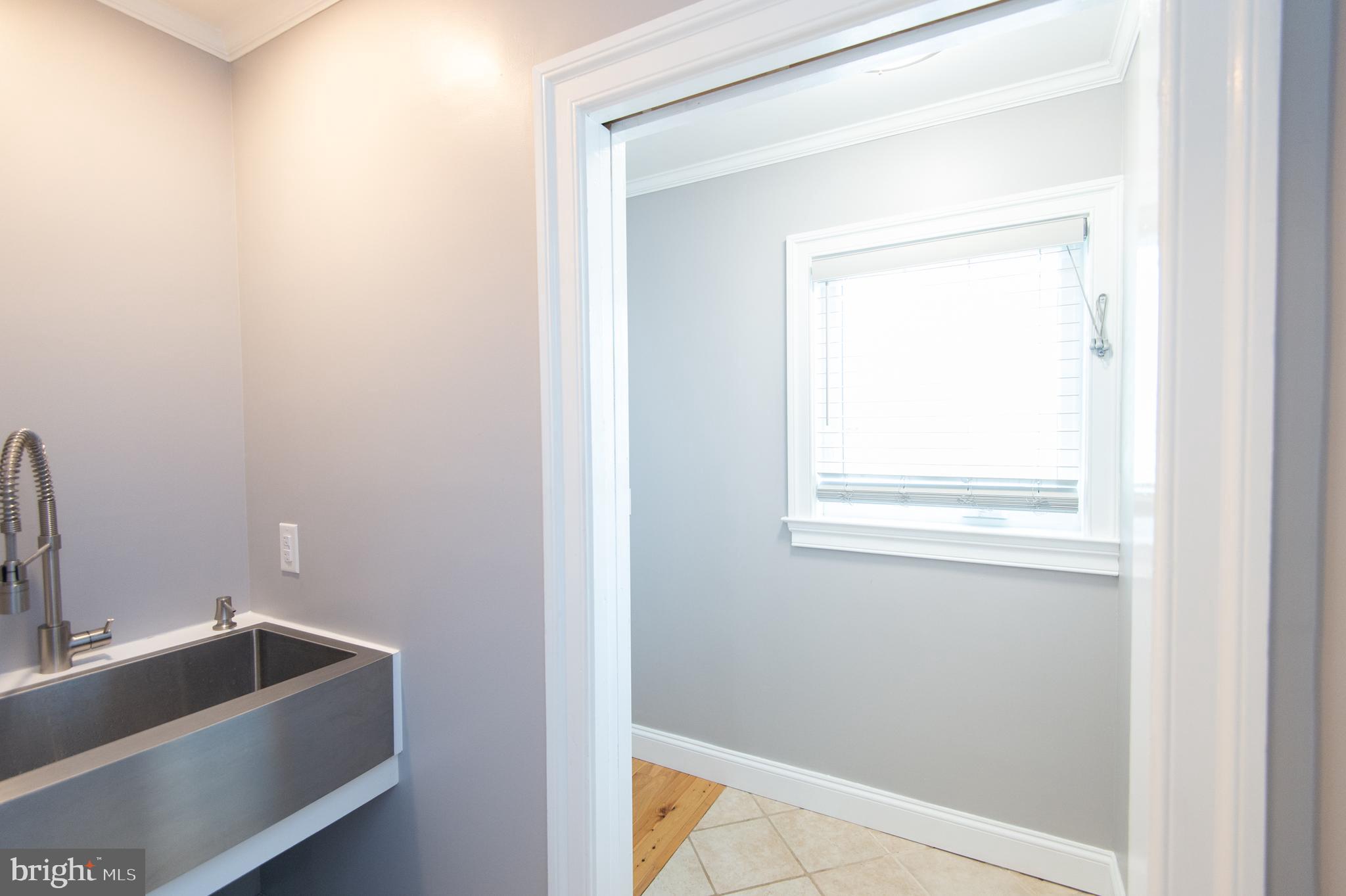 6106 Twin Point Cove Road Cambridge, MD 21613 - Photo 29 of 120 Stainless laundry sink