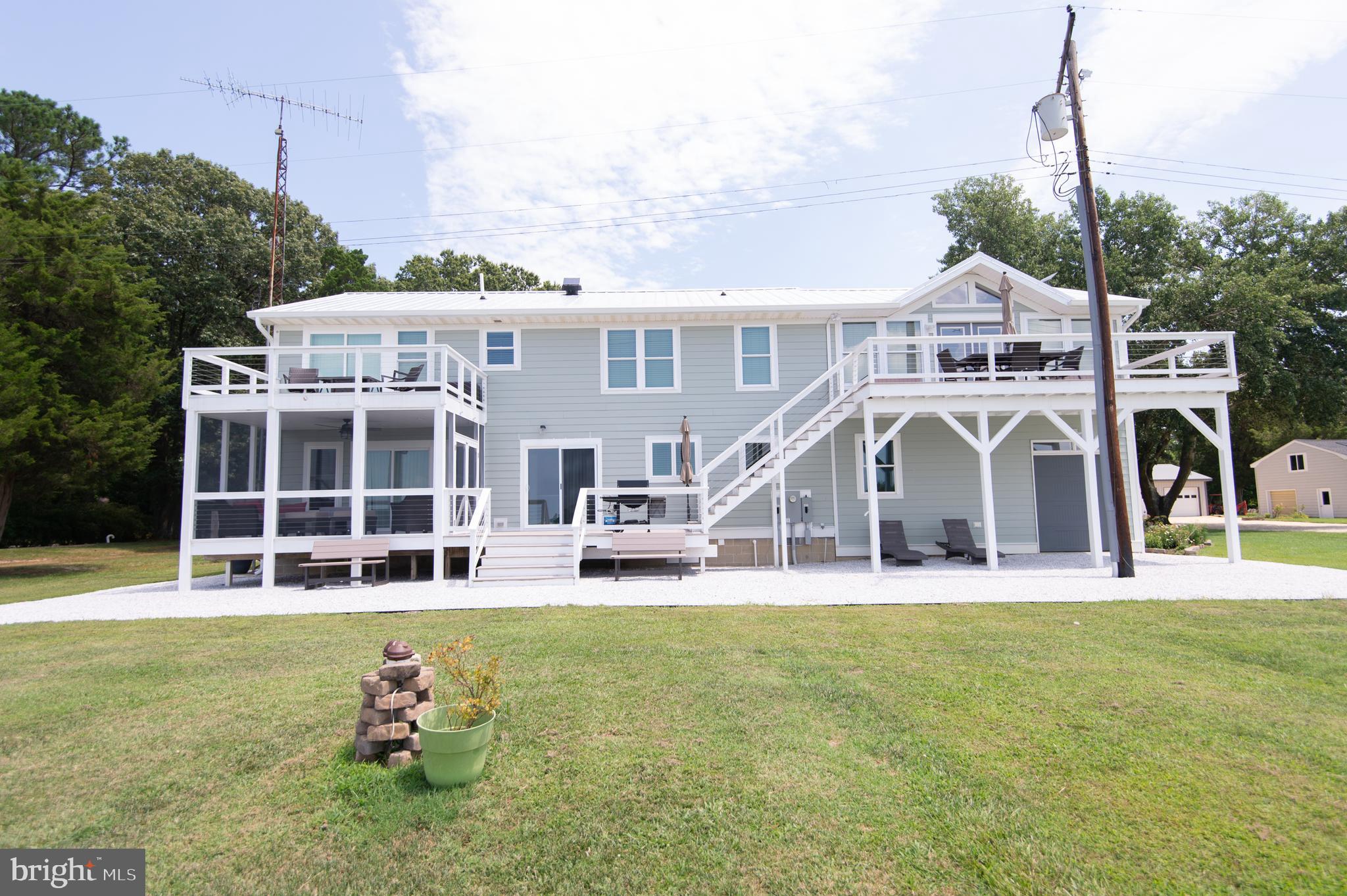 6106 Twin Point Cove Road Cambridge, MD 21613 - Photo 3 of 120 Waterside screened porch, balcony & rooftop deck