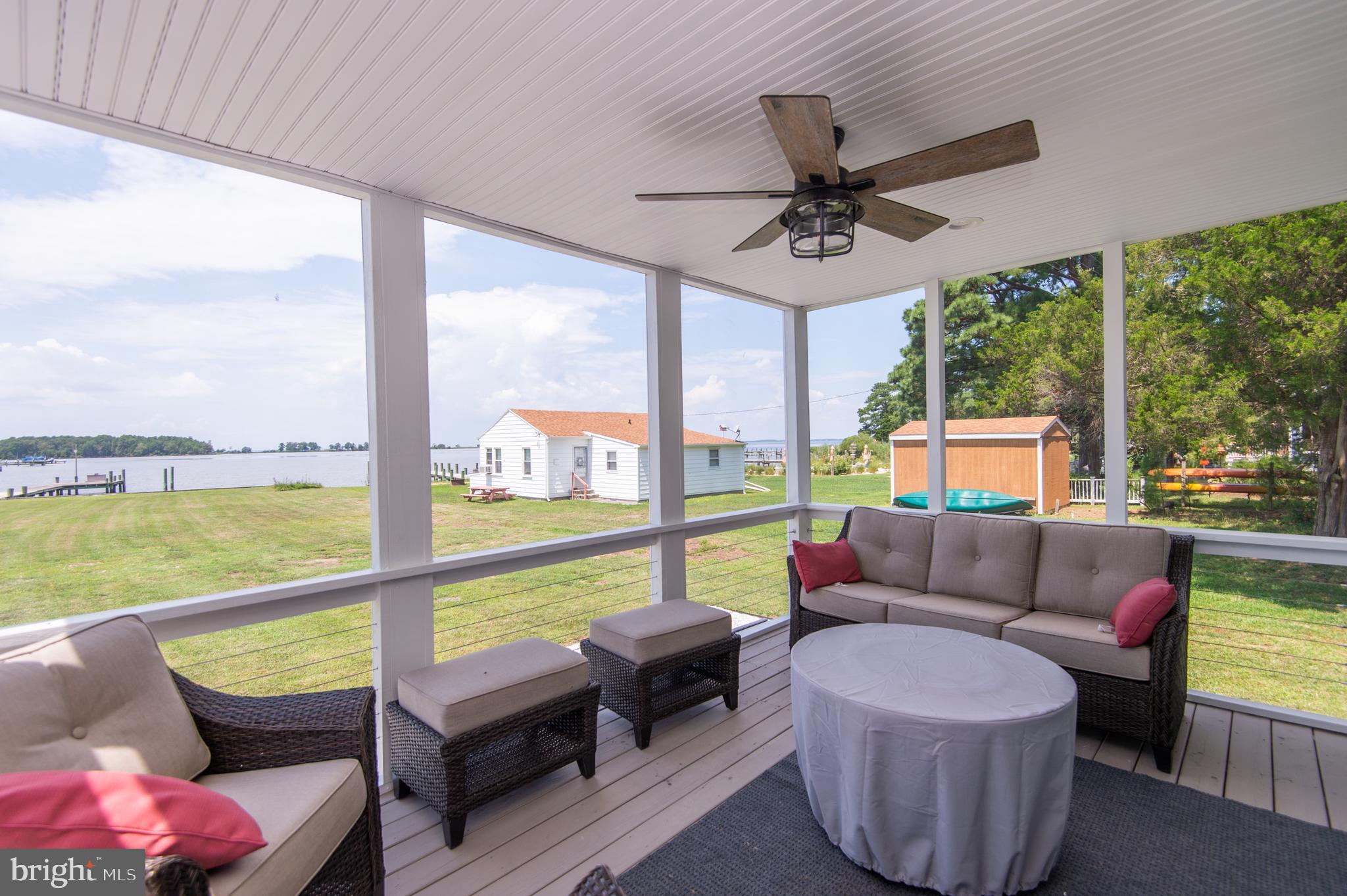 6106 Twin Point Cove Road Cambridge, MD 21613 - Photo 43 of 120 Screened porch with sunset views