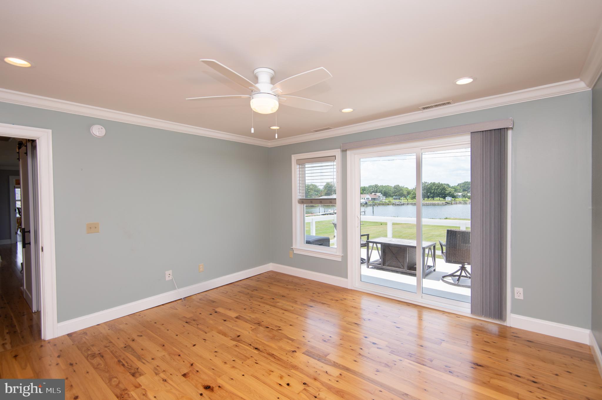 6106 Twin Point Cove Road Cambridge, MD 21613 - Photo 45 of 120 2nd floor primary bedroom with private balcony