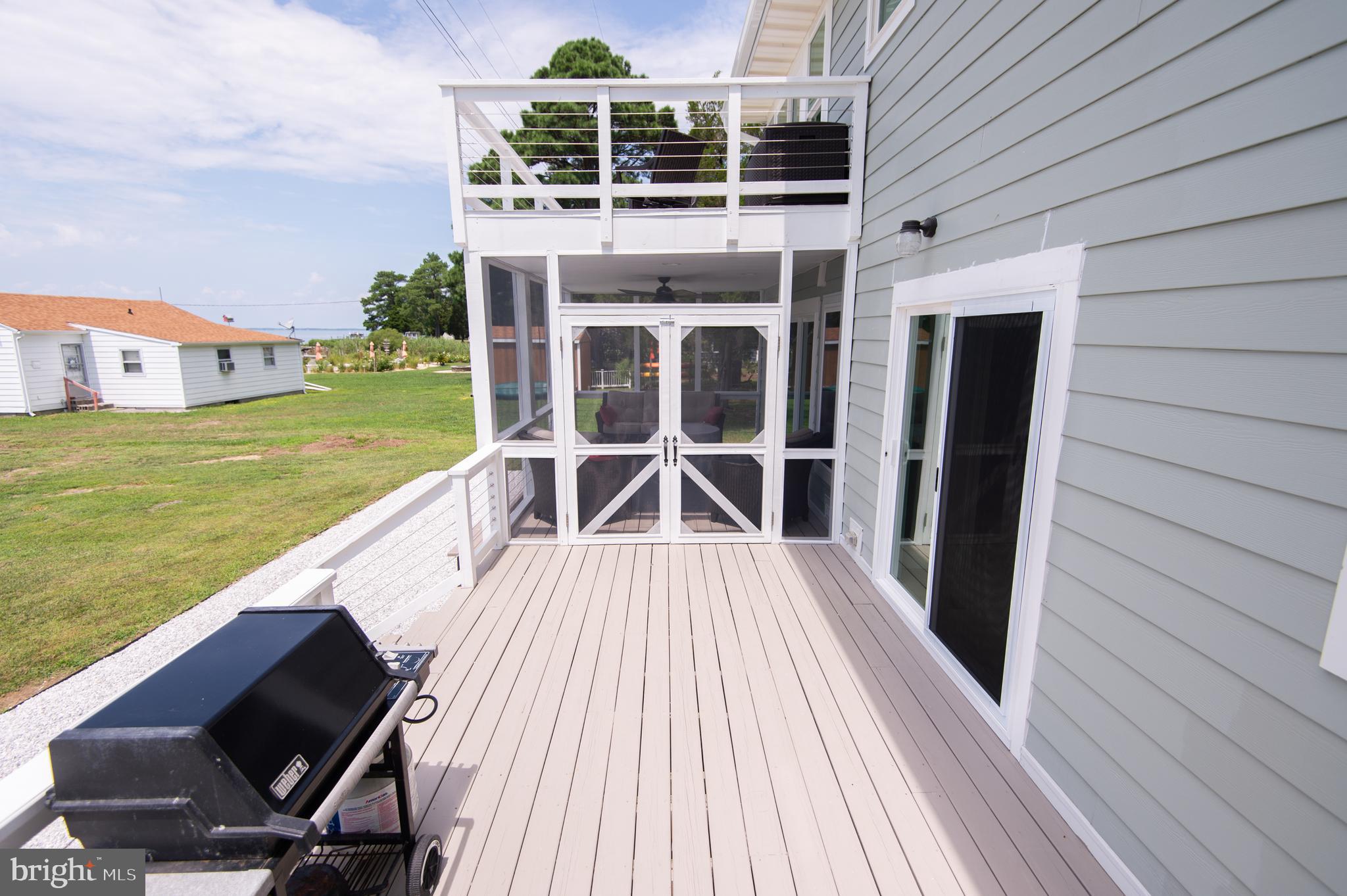 6106 Twin Point Cove Road Cambridge, MD 21613 - Photo 77 of 120 Main floor waterside deck with access from kitchen