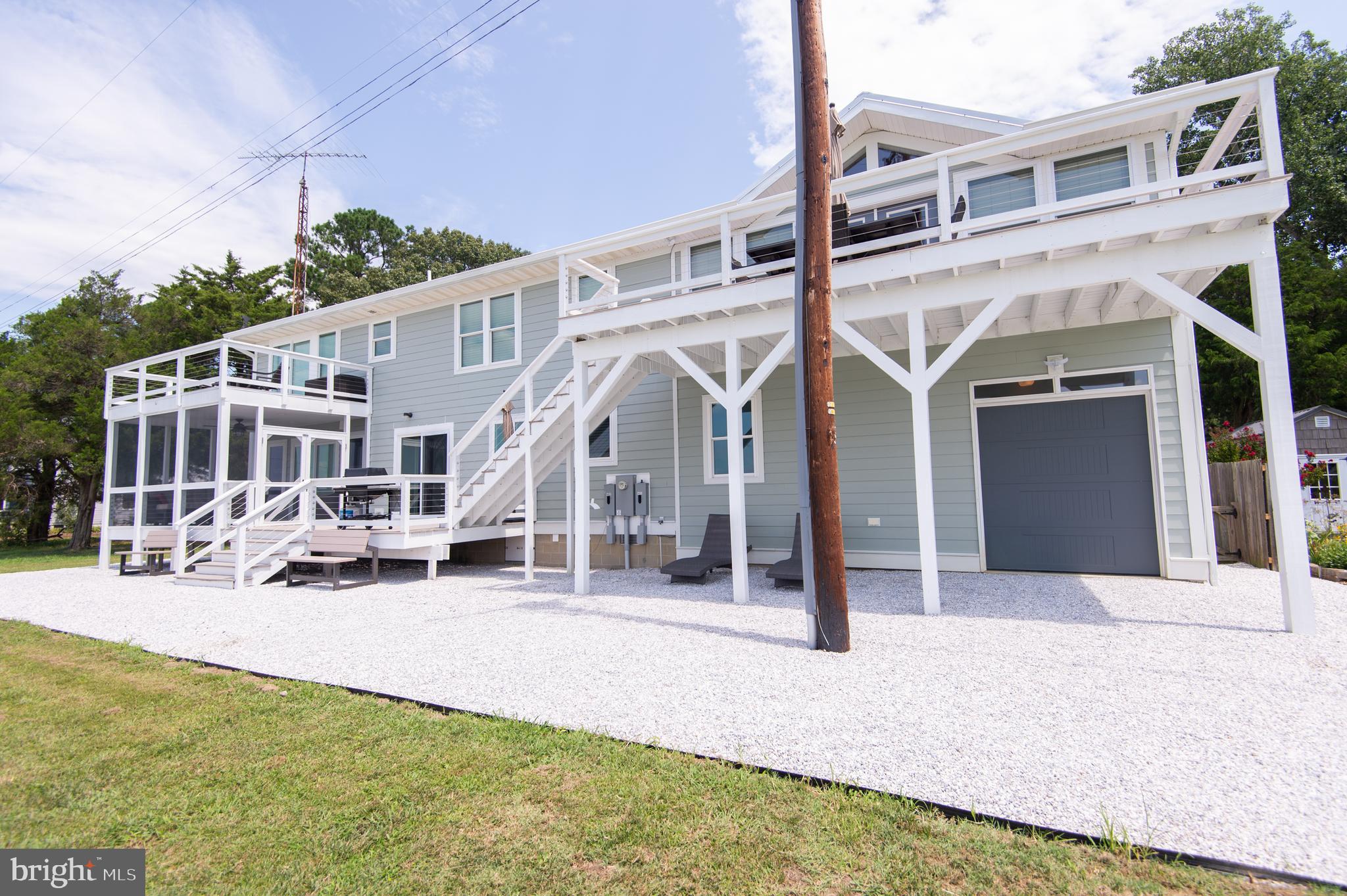 6106 Twin Point Cove Road Cambridge, MD 21613 - Photo 80 of 120 Waterside garage overhead door