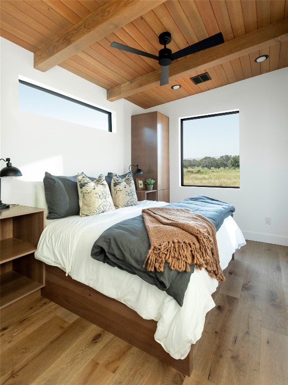 9361 Highway 290, Unit 6 Hye, TX 78635 - Photo 27 of 40 a bedroom with a bed and a night stand