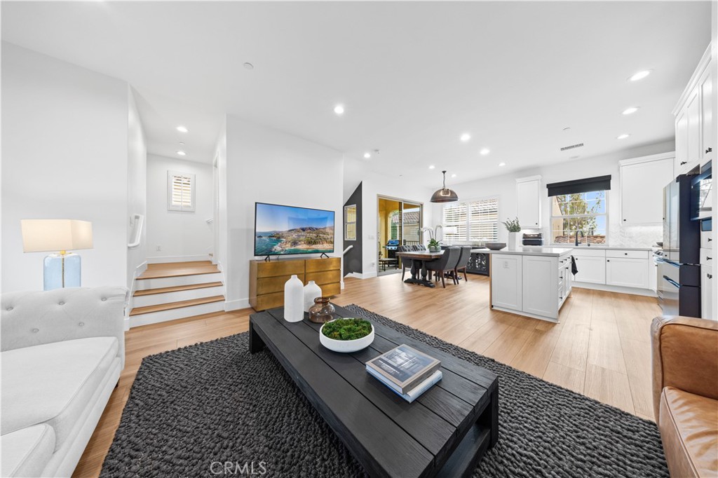 89 Kestrel Irvine, CA 92618 - Photo 18 of 45 a living room with furniture and a table