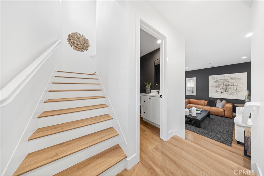 89 Kestrel Irvine, CA 92618 - Photo 21 of 45 a view of a livingroom with furniture and staircase